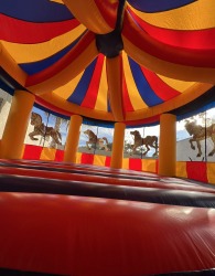 C4D155F1 364A 4C3A 8000 B1AA63BA7069 442664388 Carousel bounce house